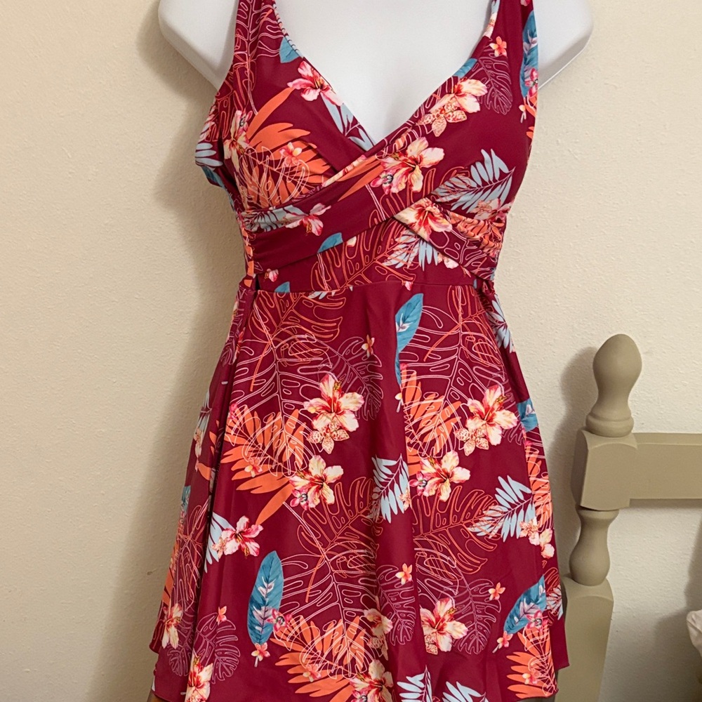 Floral Tropical skirted swimsuit.